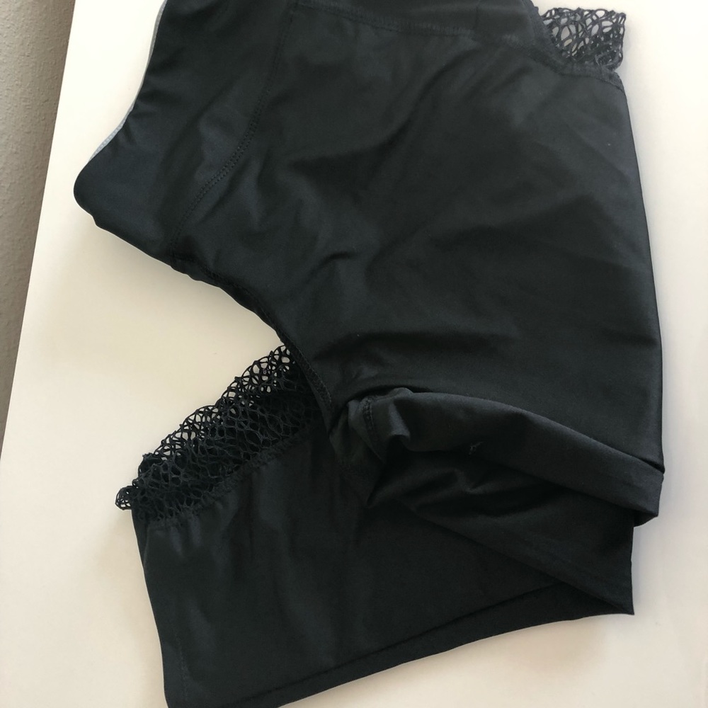Workout capri leggings with see through side